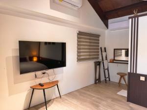 TV/trung tâm giải trí tại 峇里島漫活民宿Bali Slow Homestay