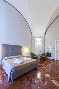 Postelja oz. postelje v sobi nastanitve B&B Centro Storico Lecce