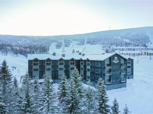 an aerial view of a resort in the snow at Stötens Stugor & Lägenheter in Stöten