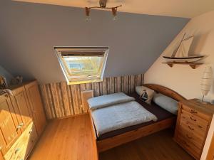 Ένα ή περισσότερα κρεβάτια σε δωμάτιο στο Ferienhaus Schöne Aussicht