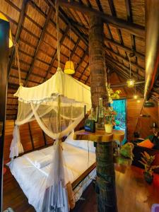 Ένα ή περισσότερα κρεβάτια σε δωμάτιο στο Chika's Place River View Udawalawa