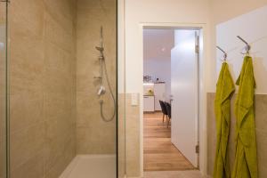 Koupelna v ubytování Private Living Apartments