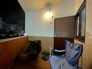 Posezení v ubytování 本陣 Urawa Sauna