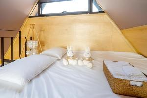 Postel nebo postele na pokoji v ubytování 가평 스페인마을 풀램핑 Spanish Village Poolamping + 156 fotografií