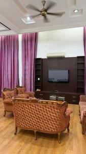 Fotografie z fotogalerie ubytování Razls Roomstay Kangar v destinaci Kangar