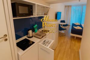 Η κουζίνα ή μικρή κουζίνα στο Holiday Point Orbi City +179 φωτογραφίες