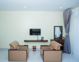 TV/trung tâm giải trí tại Naka Hotel Mộc Châu - Lầu Anh Thái +23 ảnh