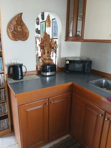 Кухня или мини-кухня в Great Value Residence
