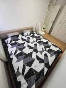 Ένα ή περισσότερα κρεβάτια σε δωμάτιο στο Apartman Magi