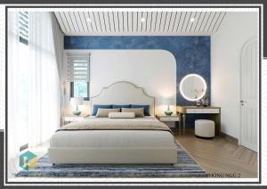 a bedroom with a white bed and blue walls at Villa Malibu Tropicana , Nova Hồ Tràm in Ấp Thanh Bình +30 photos