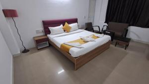 Ένα ή περισσότερα κρεβάτια σε δωμάτιο στο Soooper Hotel 2