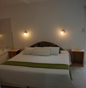 Cama ou camas em um quarto em Familia Piatti B&B - Suites