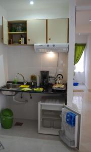 A cozinha ou cozinha compacta de Familia Piatti B&B - Suites