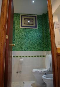 Um banheiro em Familia Piatti B&B - Suites