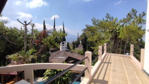 a view from the balcony of a house at Rumah Kolam Pribadi in Punten