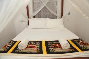 Ένα ή περισσότερα κρεβάτια σε δωμάτιο στο Shine Breeze villa