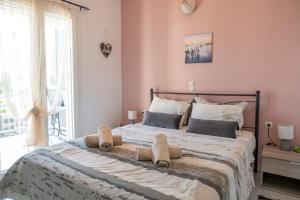 Ένα ή περισσότερα κρεβάτια σε δωμάτιο στο Bee life apts, Sweet house