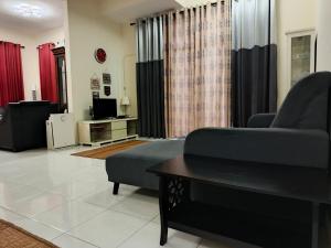 Un lugar para sentarse en Chek Embun Homestay 15 fotos más