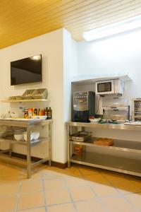 Η κουζίνα ή μικρή κουζίνα στο Hostal Yeti