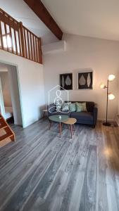 Χώρος καθιστικού στο La Petite Provence, résidence avec piscine