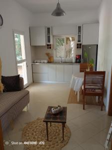 Η κουζίνα ή μικρή κουζίνα στο Chambre d'hôte les vacanciers