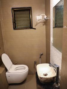 Et badeværelse på Hotel New Punjab, Nashik