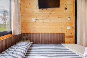 Ένα ή περισσότερα κρεβάτια σε δωμάτιο στο Minicasa La Barca