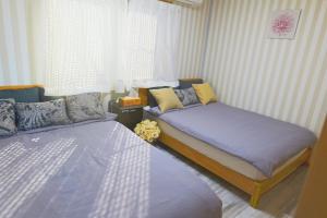 Postel nebo postele na pokoji v ubytování Qiao No,105 - Vacation STAY 75661v