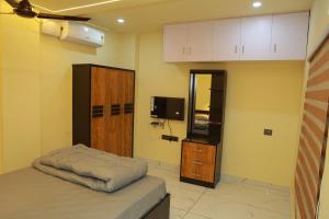 Μια τηλεόραση ή/και κέντρο ψυχαγωγίας στο SJ Homes