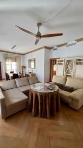 a living room with a couch and a table at Galteo Remedios in Ronda