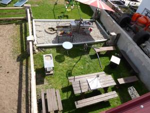 an overhead view of a park with a picnic table and an umbrella at Ferienhof Haus Sulztal in Berching