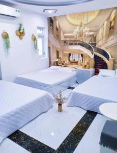 Ένα ή περισσότερα κρεβάτια σε δωμάτιο στο Hoàng Nga 2 Homestay