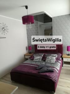 Ένα ή περισσότερα κρεβάτια σε δωμάτιο στο Apartamenty Crystal