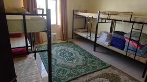 Postel nebo postele na pokoji v ubytování Oman 1