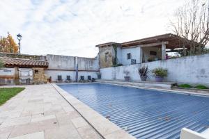 Swimmingpoolen hos eller tæt på Gîte La Ferme De Musan