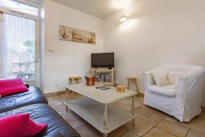 Et tv og/eller underholdning på Gîte La Ferme De Musan