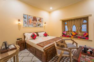 Ένα ή περισσότερα κρεβάτια σε δωμάτιο στο The second home jaisalmer