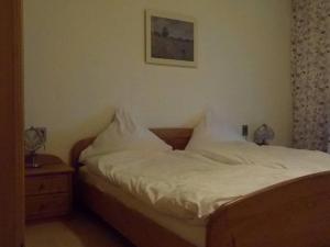 Ένα ή περισσότερα κρεβάτια σε δωμάτιο στο Ferienwohnung Konzell +12 φωτογραφίες