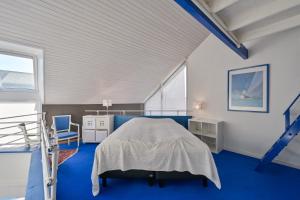 Ένα ή περισσότερα κρεβάτια σε δωμάτιο στο Villa sur la Côte Sauvage