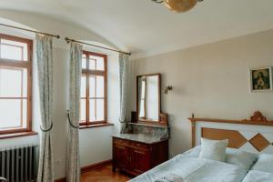 Postel nebo postele na pokoji v ubytování Penzion Šatlava