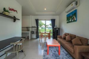 Posezení v ubytování The One Cozy