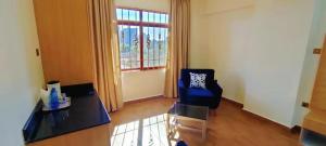 Χώρος καθιστικού στο Hays Suites Hotel +14 φωτογραφίες