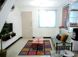 Posezení v ubytování Clark Stays Blue