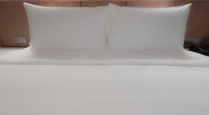 En eller flere senge i et værelse på The Federal Kuala Lumpur