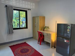 Kuchyň nebo kuchyňský kout v ubytování Baan Tai Gardens