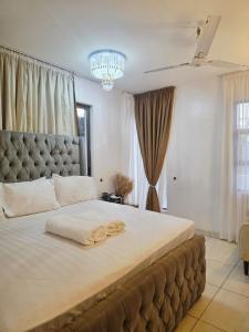 Ένα ή περισσότερα κρεβάτια σε δωμάτιο στο Winsor House