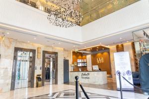 a store lobby with a chandelier in a mall at فندق لافي بارك in Mecca