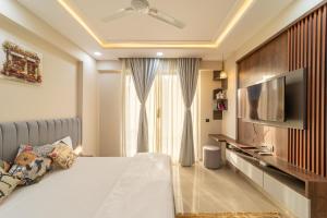 Una televisión o centro de entretenimiento en Urban oasis stay