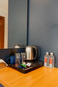 Tetera y cafetera en Urban oasis stay