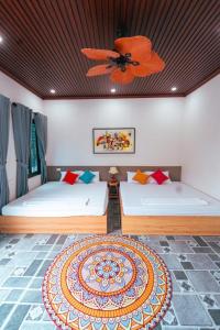 Postel nebo postele na pokoji v ubytování Edu Home